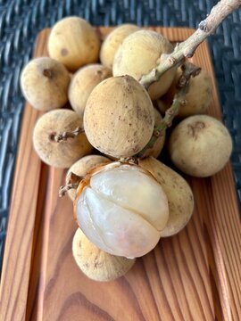 Tropical dokong fruit. Known also as Lanzones fruit or duku or langsat in southeast asia. Sweet fruit with translucent flesh. Lansium Domesticum.
