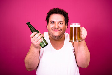 Vacation and holidays. Funny fat man resting and drinking beer.