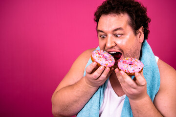 Diet and healthy lifestyle. Funny fat man and sweet donuts.