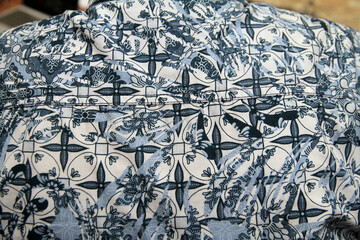 Batik Indonesian: is a technique of wax-resist dyeing applied to whole cloth, or cloth made using this technique originated from Indonesia
