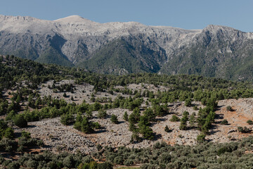 Beautiful nature view with huge mountains under blue sky in Crete, Greece.