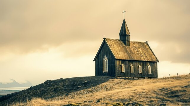 An old wooden church on a hill in Iceland, processed with a vintage effect, evoking timeless faith and solitude