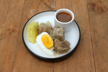 siomay. traditional indonesian food with peanut sauce. dumpling
