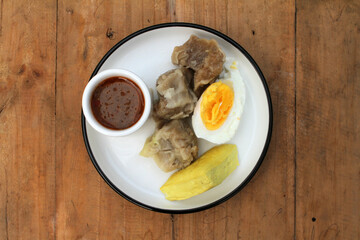 siomay. traditional indonesian food with peanut sauce. dumpling
