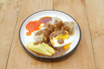 siomay. traditional indonesian food with peanut sauce. dumpling
