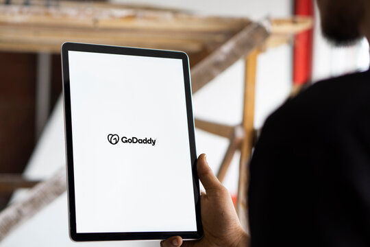 Dhaka, Bangladesh- 13 Oct 2024: GoDaddy logo is displayed on iPad.