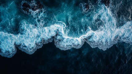 Aerial View of Ocean Waves Crashing and Breaking