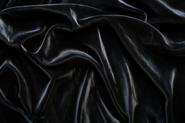 Fototapeta premium Black smooth satin velvet wave background