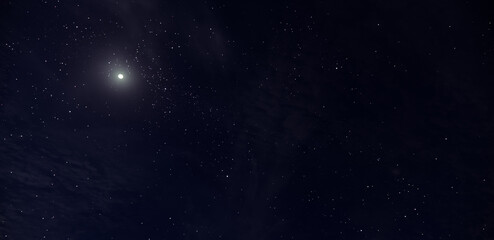 Beautiful Night sky with stars shining over moon clear from cloud