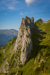Obraz premium Aerial shot of the Chruzberg summit ridge, also known as Kreuzberg, located in the Swiss canton of St. Gallen on the eastern edge of the Alpstein. Mountain called Saxer Lucke