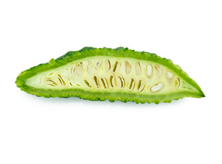 slices of bitter gourd arranged on white background