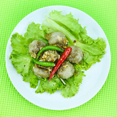 Steamed tapioca balls with peanut and pork filling