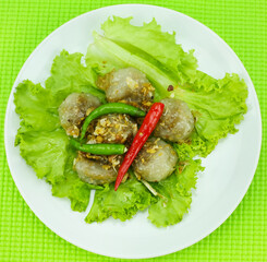 Steamed tapioca balls with peanut and pork filling