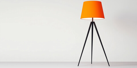 Modern orange floor lamp illuminating empty room with white wall