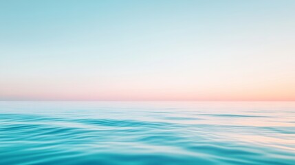 Fototapeta premium Calm blue sea at sunset with red horizon lines