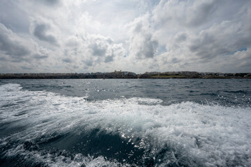 Polignano coast in Italy seen from a boat