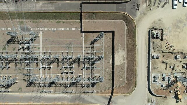 Solar projects high voltage Subestation  during construction seem from drone 
