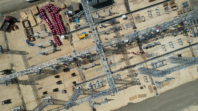Solar projects high voltage Subestation  during construction seem from drone 