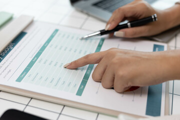 The executives are reviewing the information in the important documents