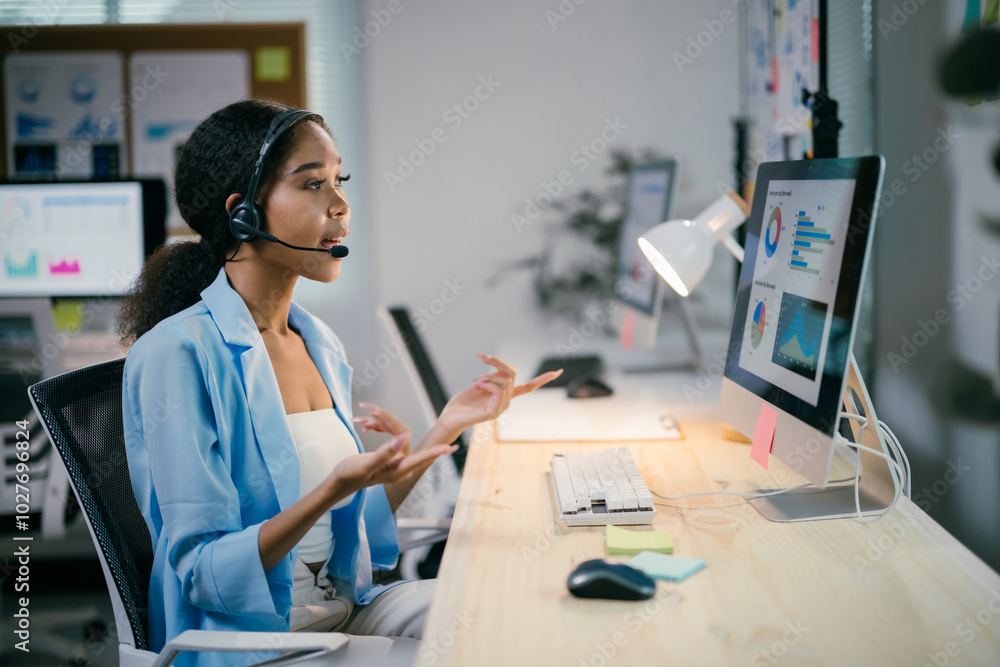Poster focused businesswoman in video call at modern office, analyzing data and explaining information onli