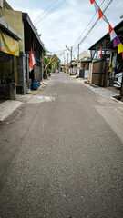 Festive Indonesian Neighborhood Street Decorated with Flags