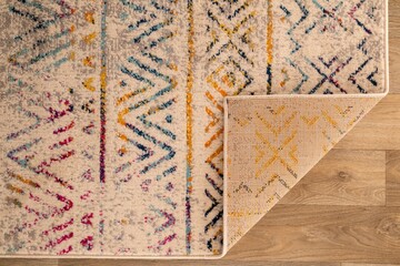 Square corner fold of a specially designed carpet