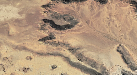 The landscape of the sandy desert in Qatar from a bird's eye view