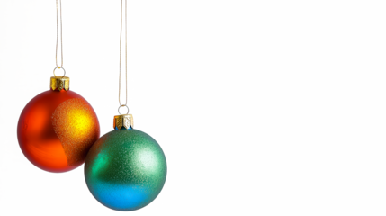 Two Christmas ornaments hanging from a string