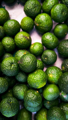 Fresh Green Limes in a Pile, Organic Citrus Fruits