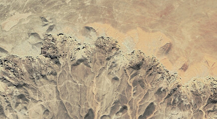 The landscape of the sandy desert in Qatar from a bird's eye view