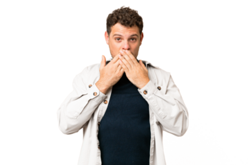 Brazilian man over isolated chroma key background covering mouth with hands