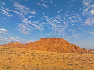 Red granite rocks and hills nearby Twyfelfontein, Namibia