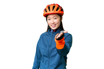 Young cyclist woman over isolated chroma key background shaking hands for closing a good deal