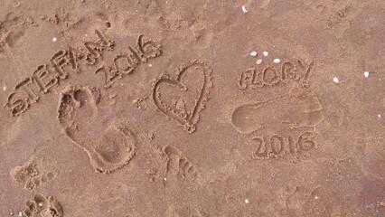 footprints in the sand, romantic memories on the beach