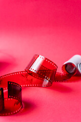 Artistic Red Film Strip on Pink Background