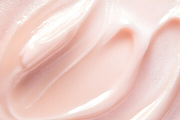 Minimalistic photo of airy highlighter showcasing a smooth, creamy texture in a soft pink hue, emphasizing elegance and beauty in skincare products