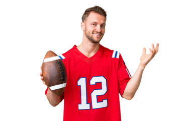 Young caucasian man playing rugby over isolated chroma key background extending hands to the side for inviting to come