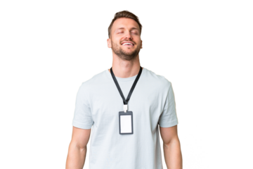Young caucasian man with ID card over isolated chroma key background laughing