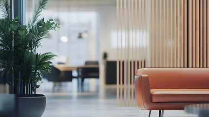 Fototapeta premium A modern office space featuring an orange couch and decorative plants.