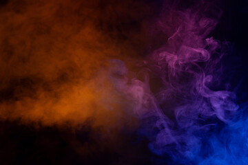 Blue and pink steam on a black background.