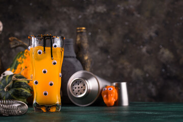 Spooky Halloween cocktail with eyes