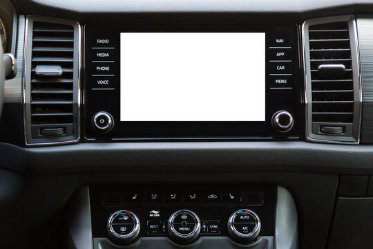 Car interior background. Multimedia touchscreen system in a modern luxury car. Blank white screen