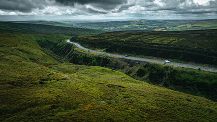 Aerial view of curvy windy roads on a moody summer day in Yorkshire, UK