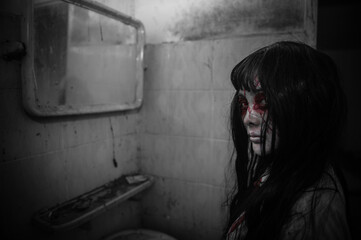 Portrait of asian woman make up ghost,Scary horror scene for background,Halloween festival...