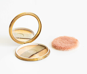 Open Vintage Powder Box with Stained Mirror and Powder Puff Sponge – Isolated on White Background