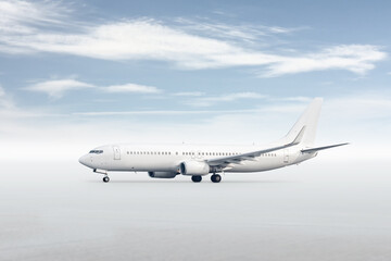 White passenger jet plane isolated on bright background with sky