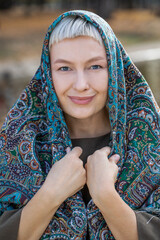 Russian beauty - young beautiful woman in a traditional headscarf
