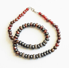 Obraz premium Colorful Glass Bead Necklace – Boho Style Jewelry Flatlay on White Background