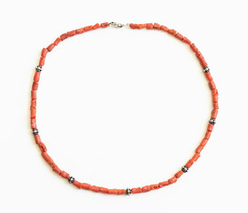 Naklejka premium Boho Real Coral Bead Necklace – Natural Coral Jewelry Flatlay on White Background