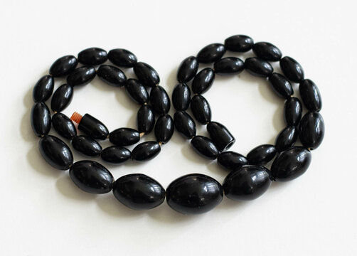 Black Bakelite Necklace &ndash; Vintage Style Jewelry Flatlay on White Background